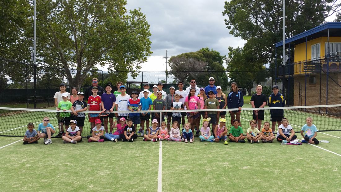 Synthetic grass courts and clubhouse at Coleman Park Tennis Club, Georges Hall
